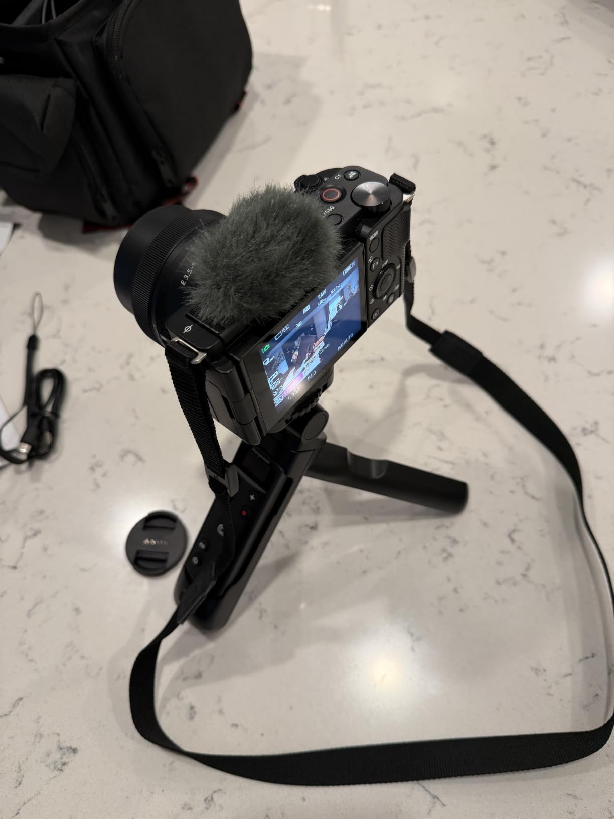 for Sony Tripod Wireless Shooting Grip with Shutter Release - Mini-Tripod with Rechargeable Remote Control for ZV-E10/ZV-E1/ZV-1/ZV-1F/RX100 VII/RX0 II/A6700/A6400/A6600/A7 III/FX3/FX30 - for Vlogging customer photo 1