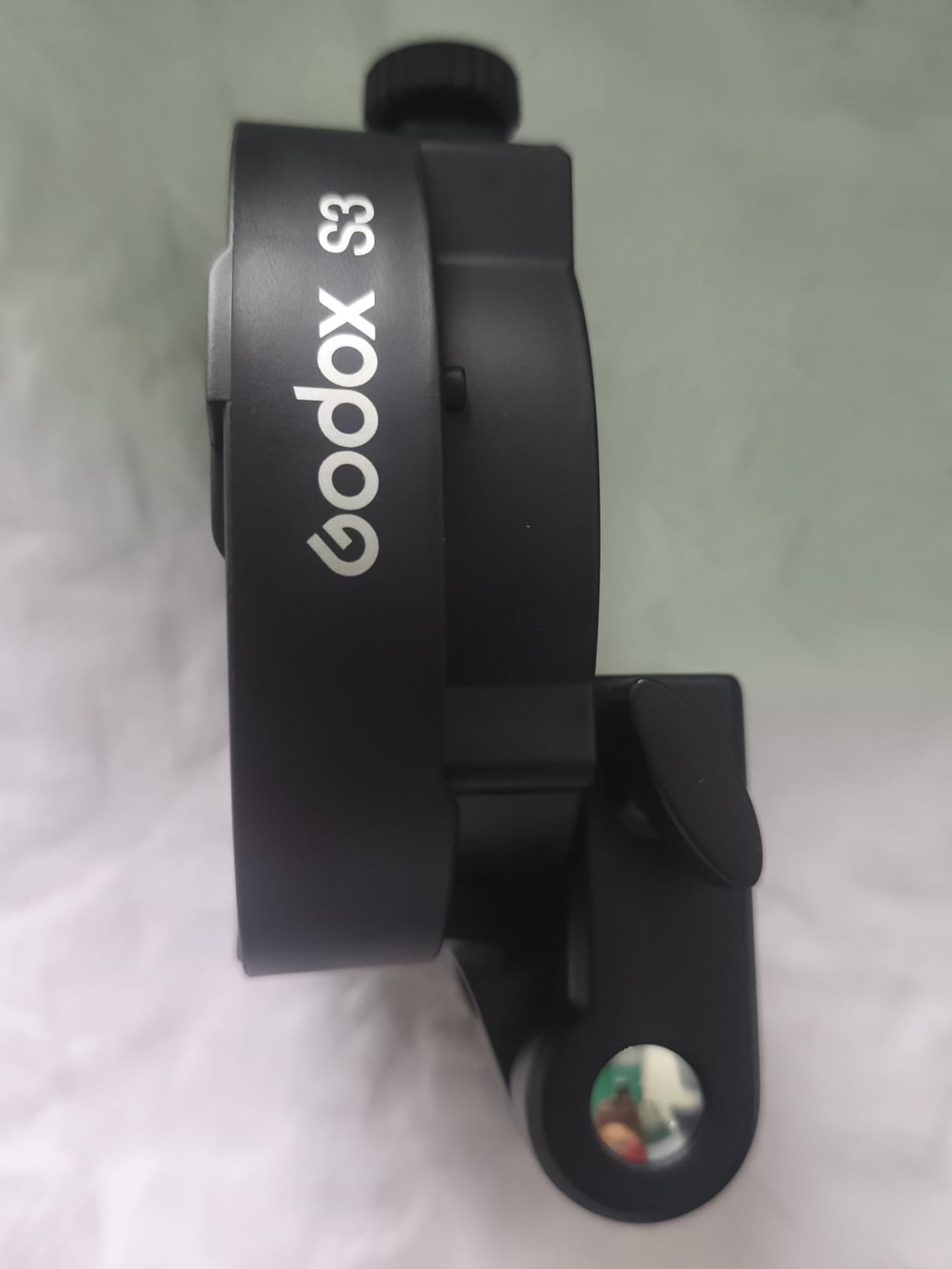 Godox S3 Bowens Mount Flash Bracket, Compact & Lightweight with ±90° Tilt, Non-Slip Silicon Padding for Stable Setup, for AD300/AD200/AD100 Outdoor Flash, for V100/V1Pro/V1/V860III Speedlite customer photo 1